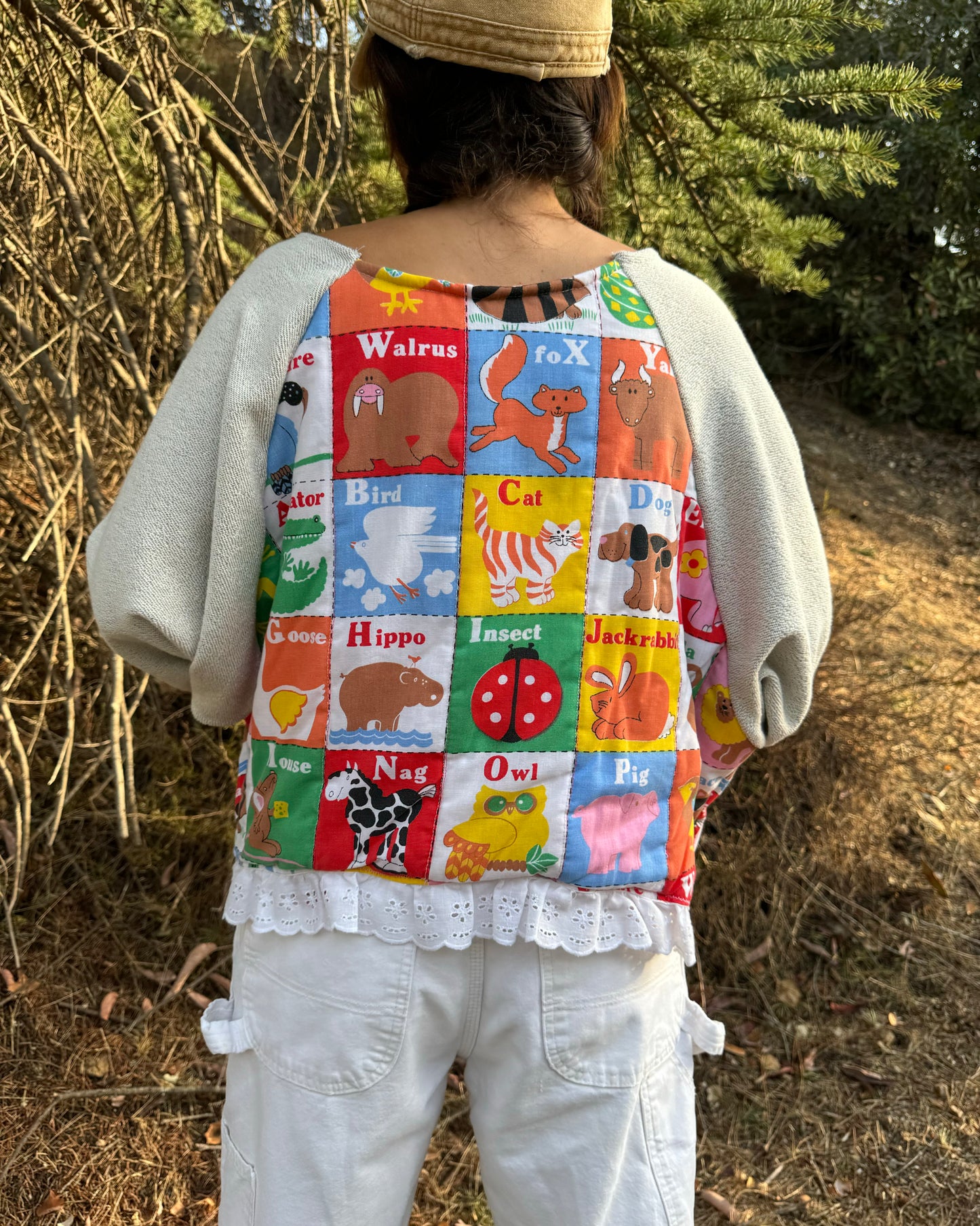 Playful Animal Quilt Sweater